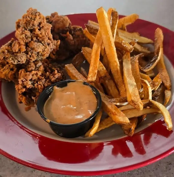 Fried chicken liver basket with fresh-cut fries and comeback sauce