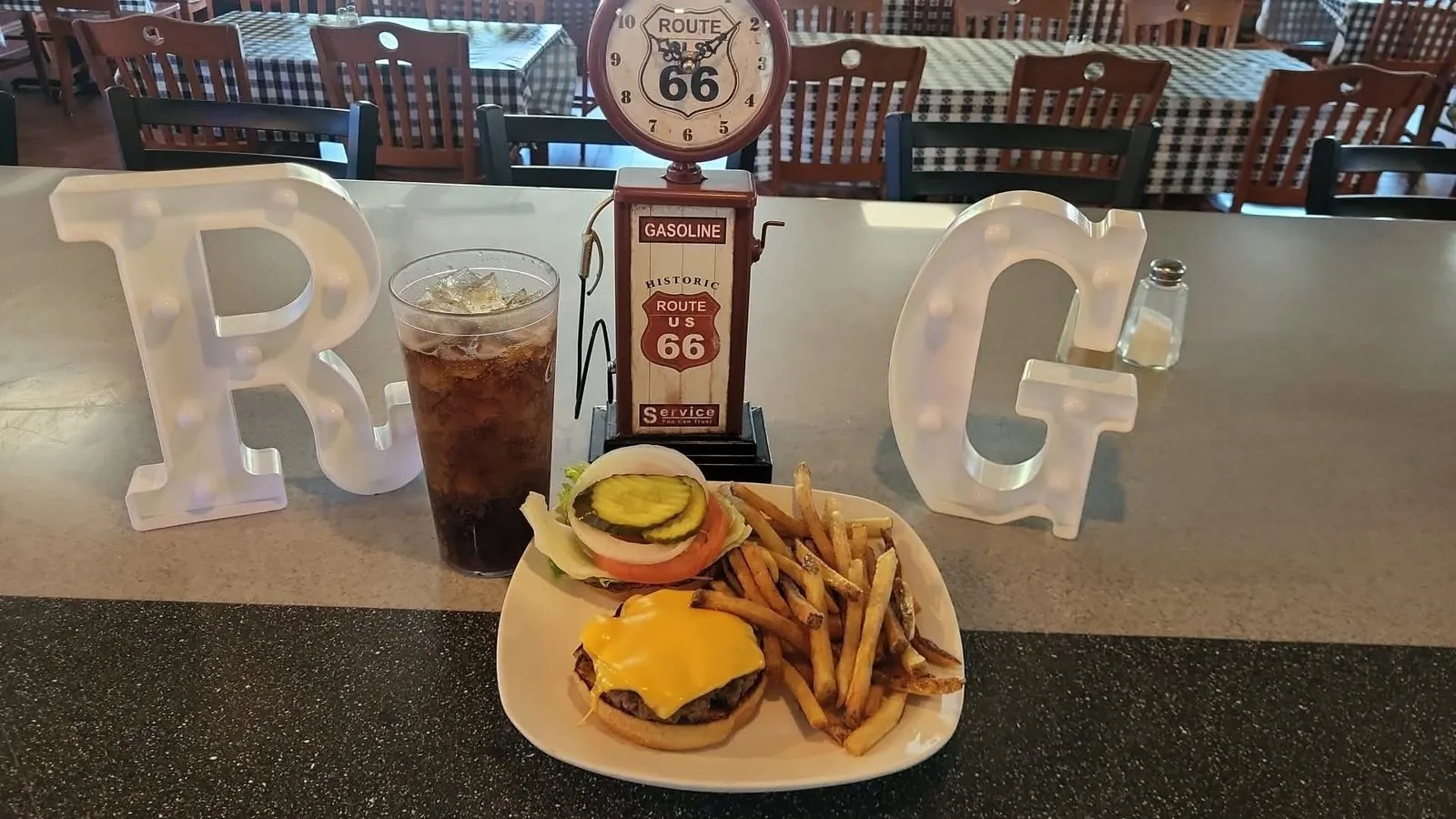 Roadside Grill dining room with checkered tablecloths and Route 66 decor